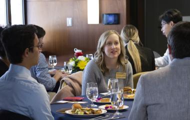 students eating lunch around a table